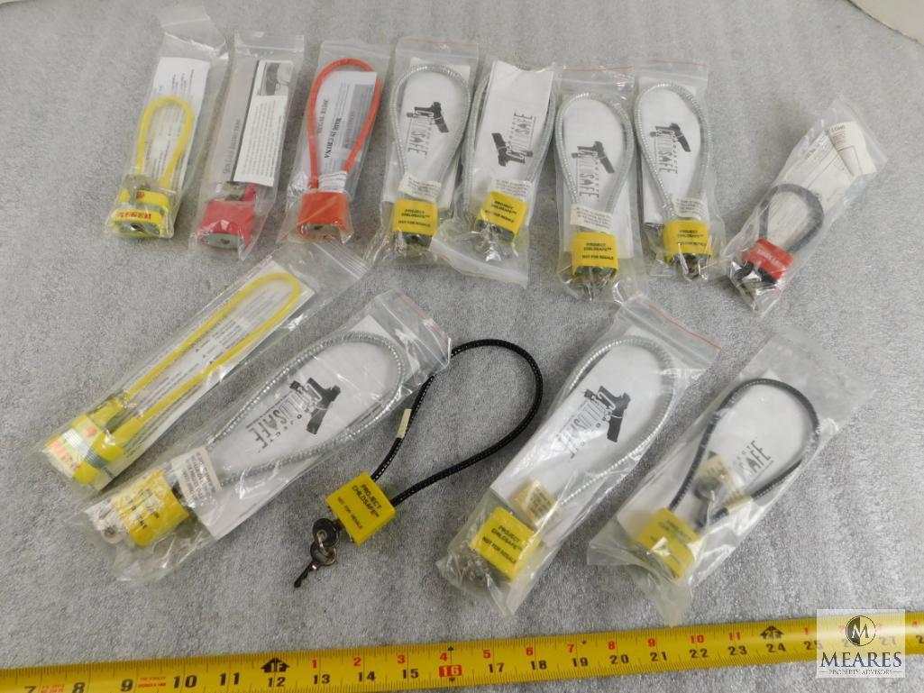 Lot of Approximately 12 Gun Cable Locks