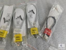 Lot of Approximately 12 Gun Cable Locks