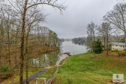 Docked Lake Secession Home with Outbuildings and Private Boat Ramp