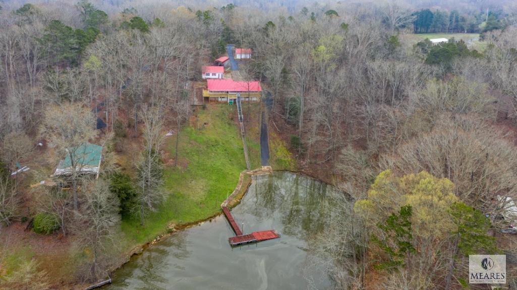 Docked Lake Secession Home with Outbuildings and Private Boat Ramp