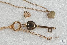 Lot of 2 Costume Jewelry Bracelets - gold tone with heart charm & skeleton key with rhinestones
