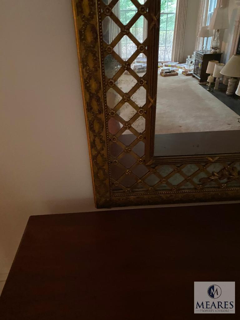 Beautiful, wall-size antique mirror with gilded edges