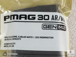 Two new 30 round Magpul Pmag AR 15 5.56, .223 rifle magazines.