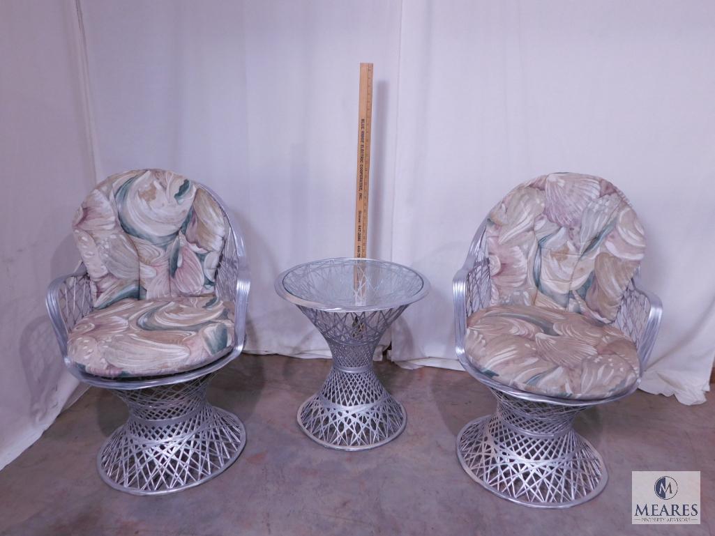 Two Silver-colored Wicker Chairs and Occasional Table