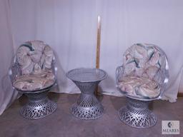 Two Silver-colored Wicker Chairs and Occasional Table