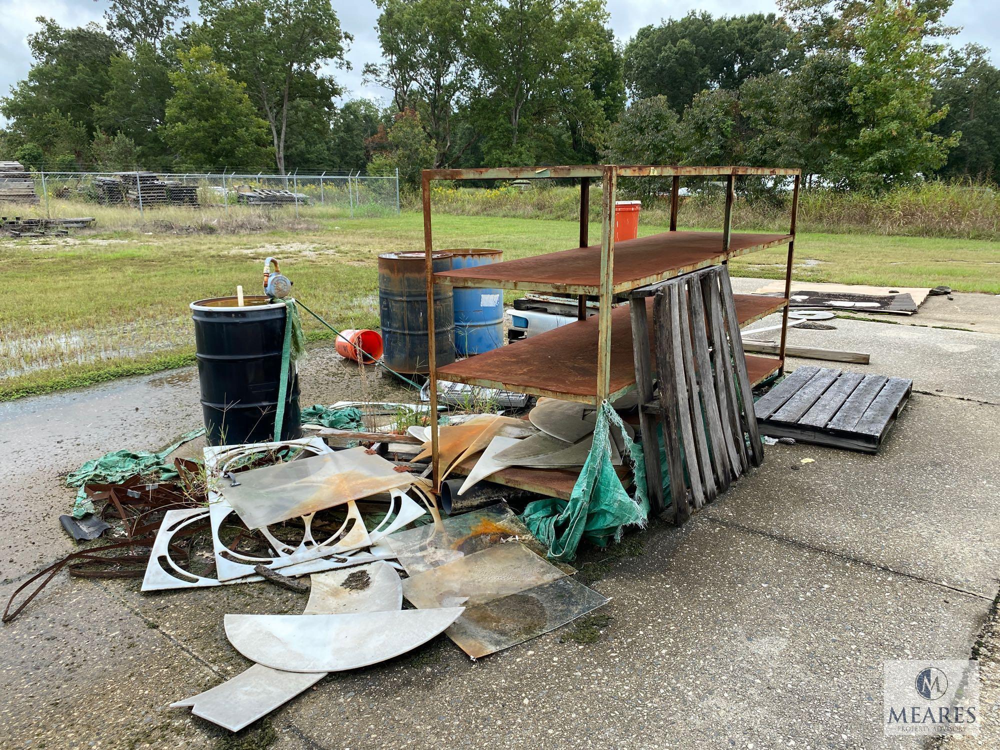 Metal Racks Behind Building - Metal Racks and Scrap