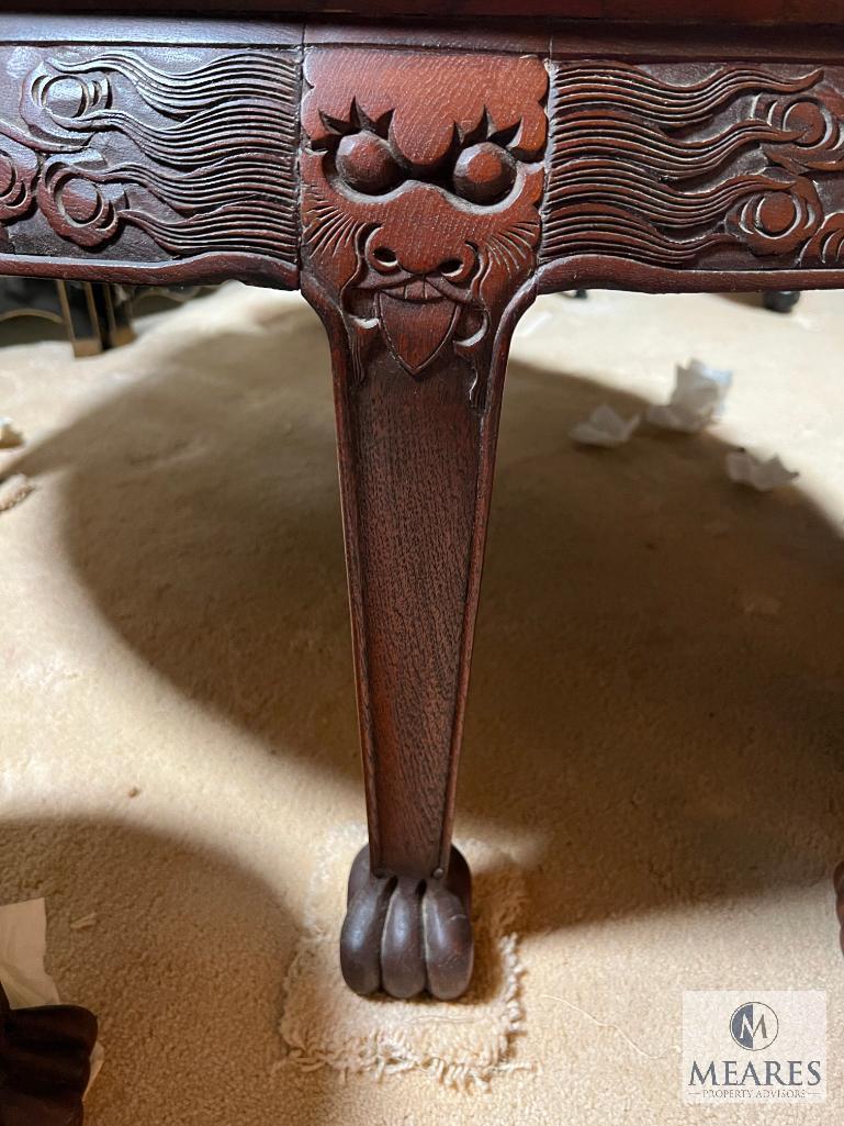 Asian-Influenced Low Coffee Table with Glass Top and Ornate-Carved Design