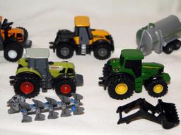 1006 MINI SERIES - LOT INCLUDES TRACTORS AND PULL BEHIND TRAILERS AND JUMBO TANK XL3000 ATTACHMENTS