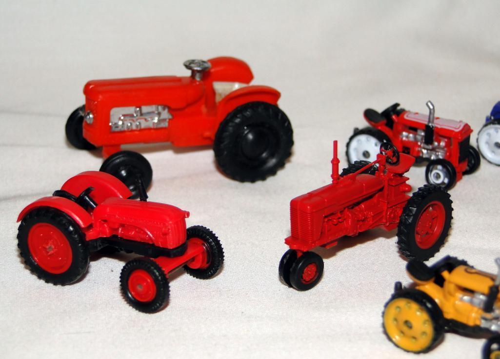 MIXED LOT PLASTIC TRACTORS: (1) CURSOR, (2) SPAIN; (1) HONG KONG; (6) UNBRANDED