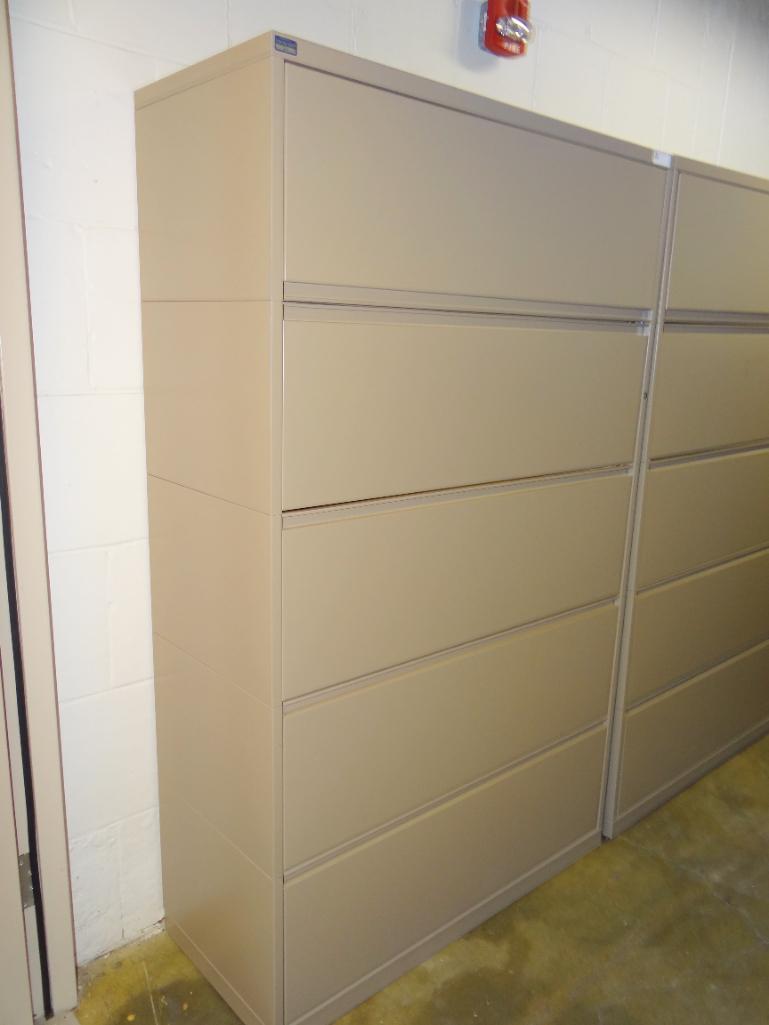 LATERAL FILE MEASURING 42 X 18 X 69 INCHES HIGH, TOP HAS SLIDE TOP OPENING, 4 DRAWERS ARE PULL