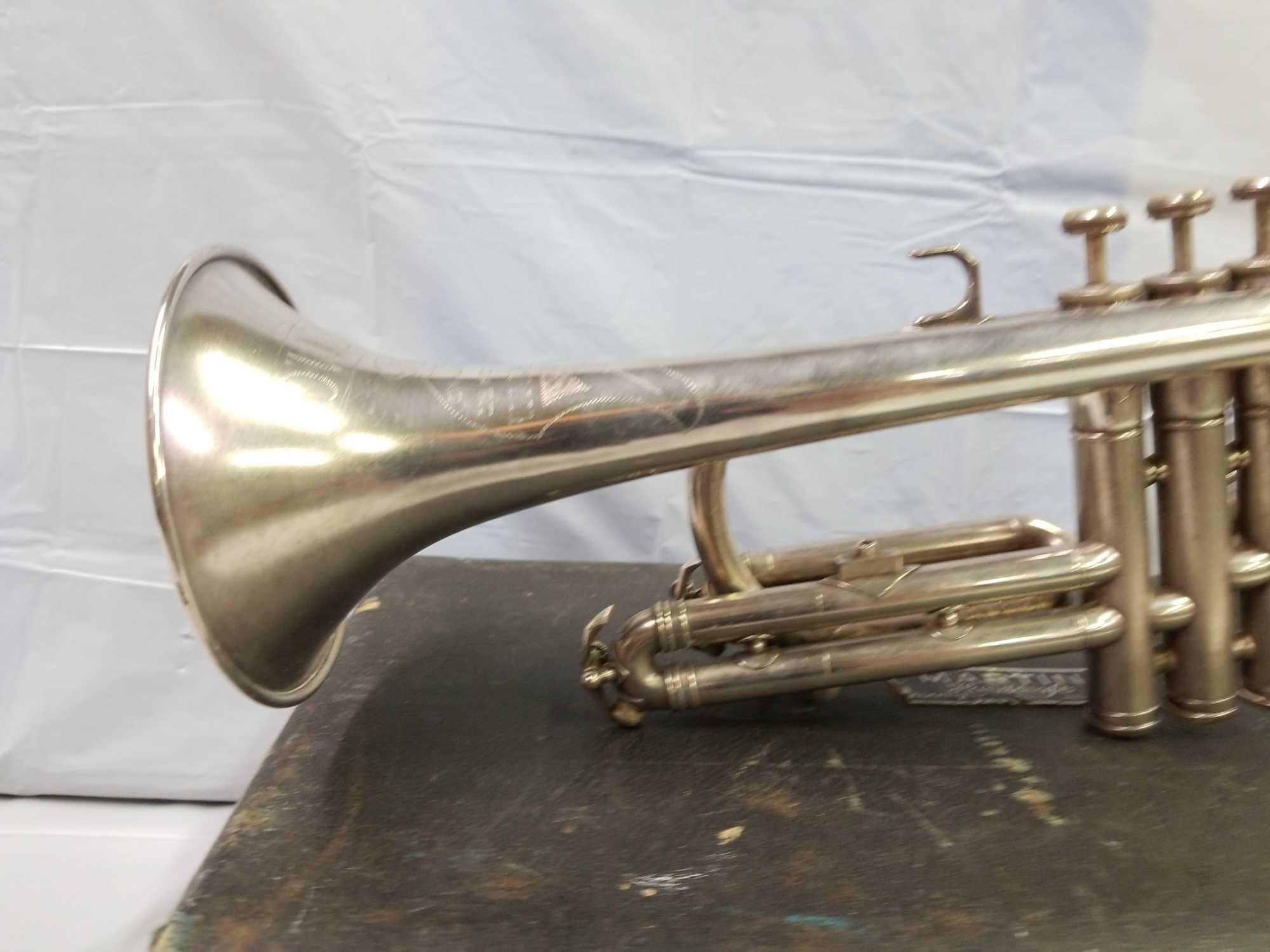 Martin Standard United States Marine Corps trumpet/cornet that appears to be in good condition.