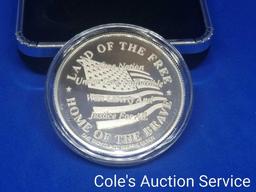 Coins of America Land of the Free one troy ounce fine silver coin. Beautiful mirror-like finish in