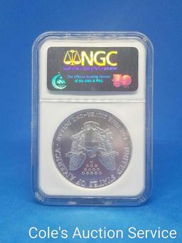 1999 US Mint American silver eagle dollar. Graded MS69 by NGC.