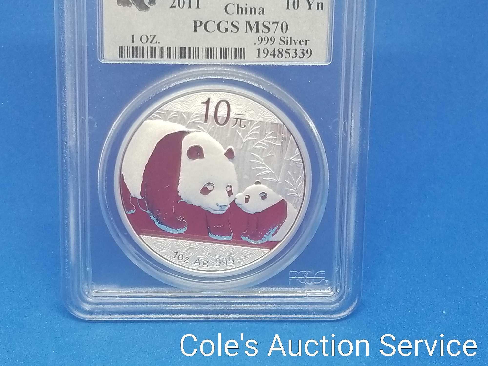 2011 Chinese first strike 1 oz silver coin. Beautiful coin graded MS70 by PCGS.