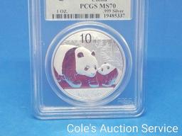 2011 first strike China 1 oz silver Panda coin. Beautiful coin graded MS70 by PCGS.