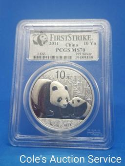 2011 Chinese first strike 1 oz silver coin. Beautiful coin graded MS70 by PCGS.