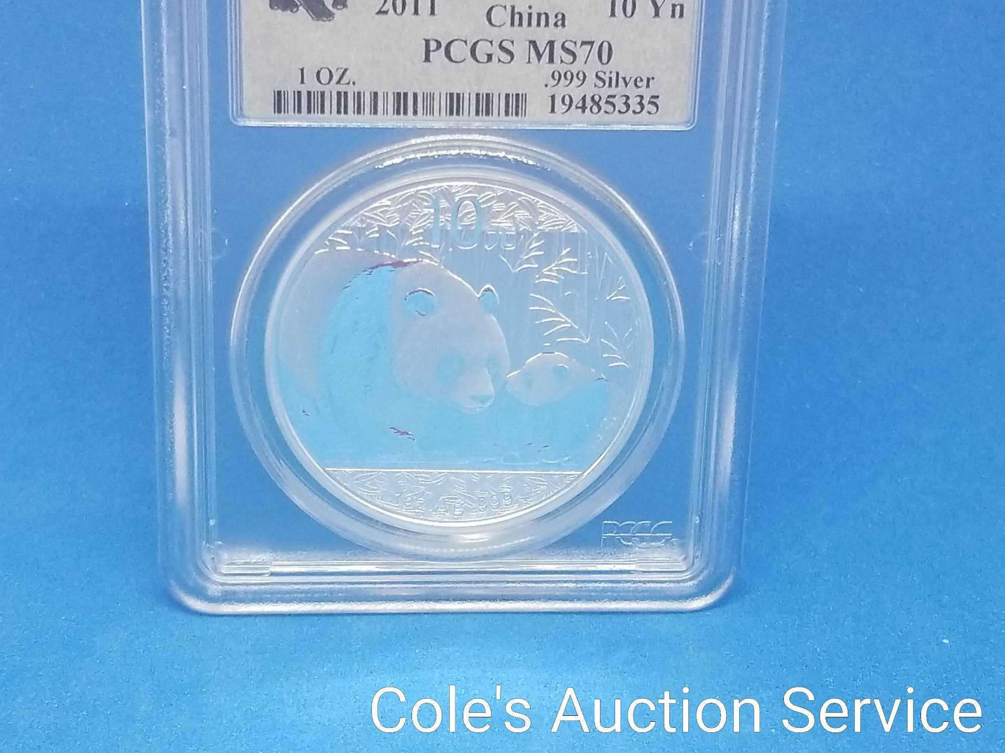 2011 Chinese first strike 1 oz silver coin. Beautiful coin graded MS70 by PCGS.