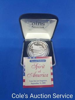 Land of the Free one troy ounce silver coin in display box. Beautiful mirror-like finish.