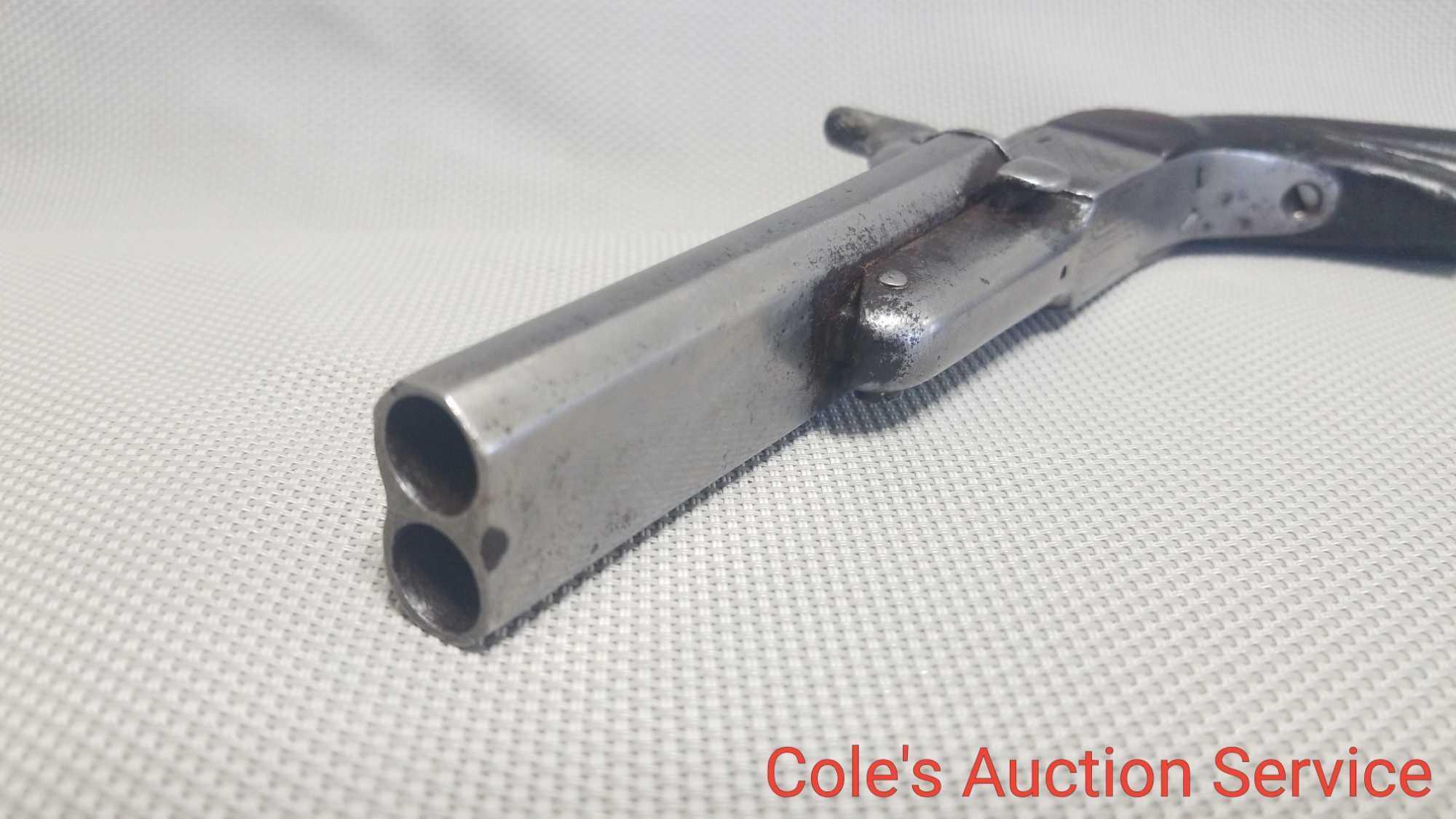 Antique pinfire double-barrel pistol that looks to be in good complete condition. See photos for