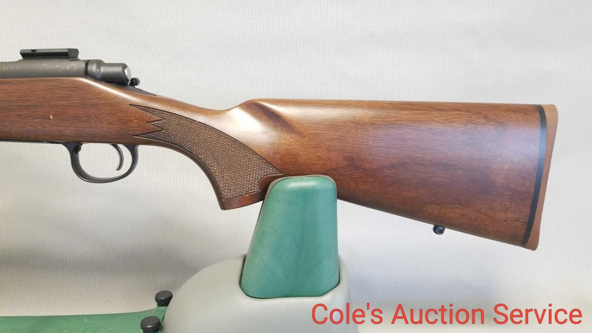 Remington 700 243 caliber bolt-action rifle. High quality black rebluing job, in beautiful