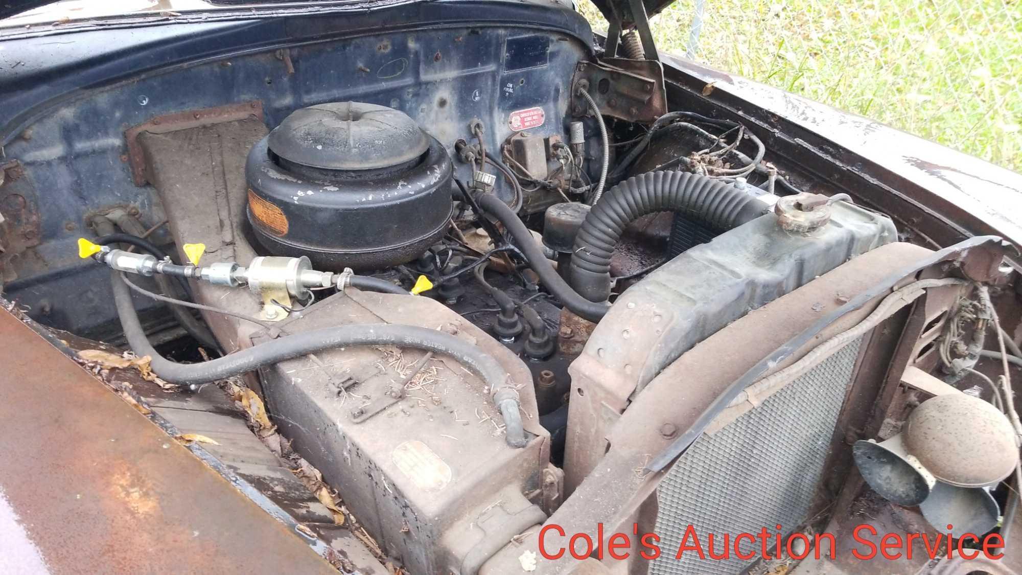 1952 Chrysler Windsor 4 door with Flathead 6 cylinder engine with clutch automatic transmission. Ran