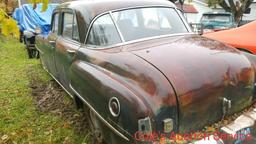 1952 Chrysler Windsor 4 door with Flathead 6 cylinder engine with clutch automatic transmission. Ran