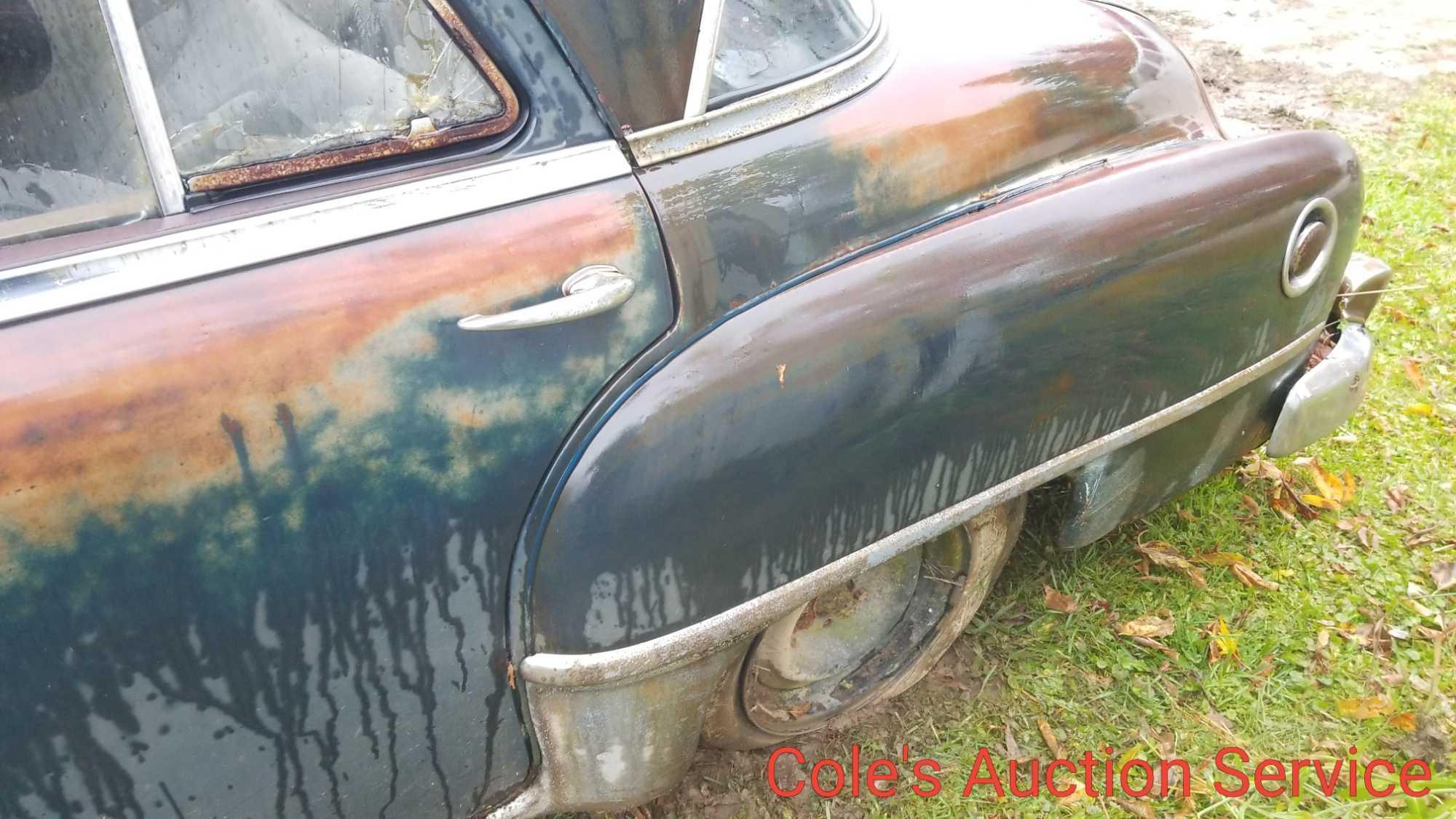 1952 Chrysler Windsor 4 door with Flathead 6 cylinder engine with clutch automatic transmission. Ran