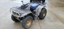 Older Yamaha quad in fair condition. Features manual transmission, new tires, front and rear racks,