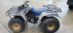 Older Yamaha quad in fair condition. Features manual transmission, new tires, front and rear racks,
