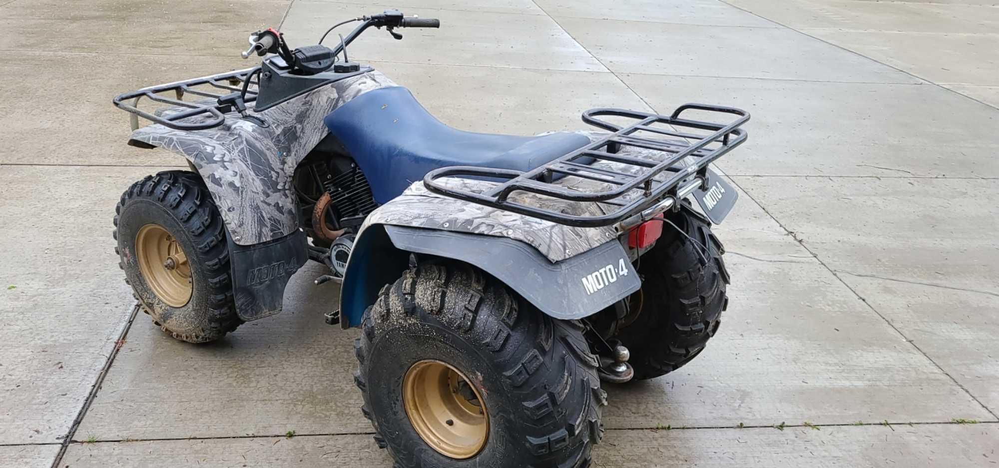 Older Yamaha quad in fair condition. Features manual transmission, new tires, front and rear racks,