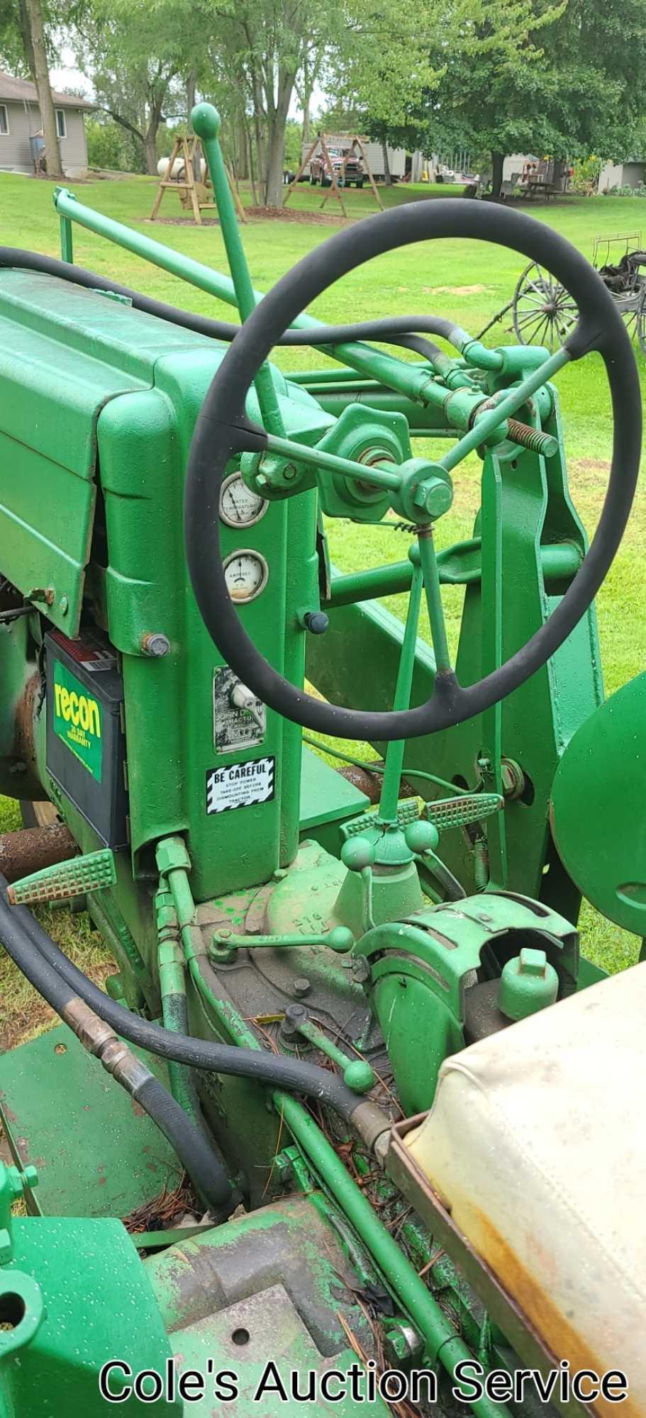 1950 John Deere Mt row crop tractor. In great condition, runs and drives excellent. Serial number