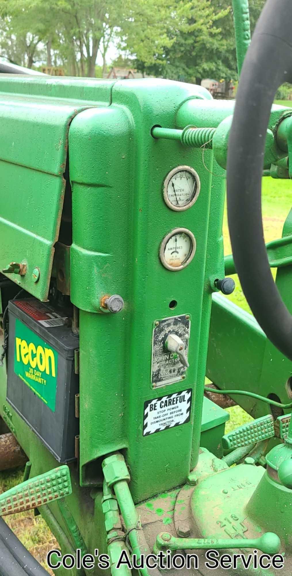 1950 John Deere Mt row crop tractor. In great condition, runs and drives excellent. Serial number