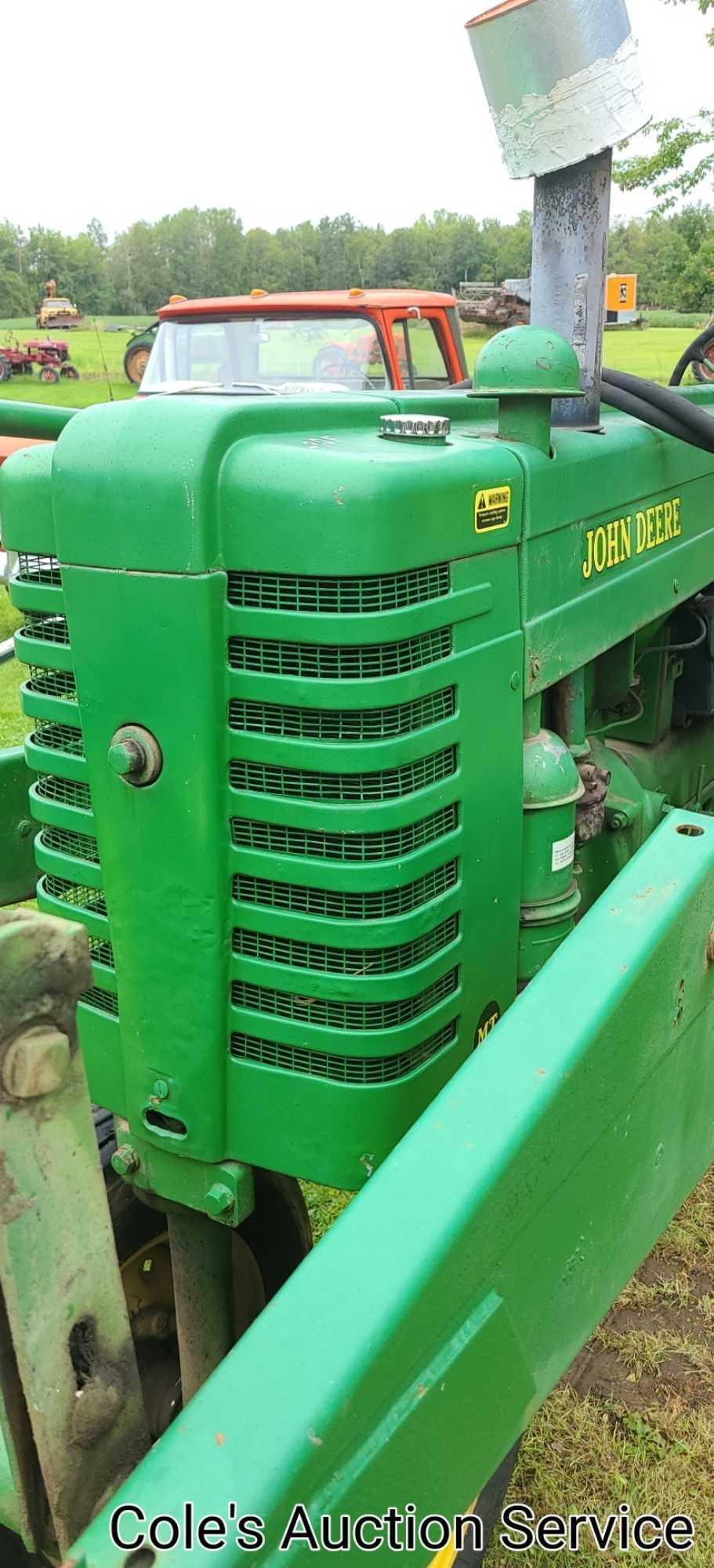 1950 John Deere Mt row crop tractor. In great condition, runs and drives excellent. Serial number