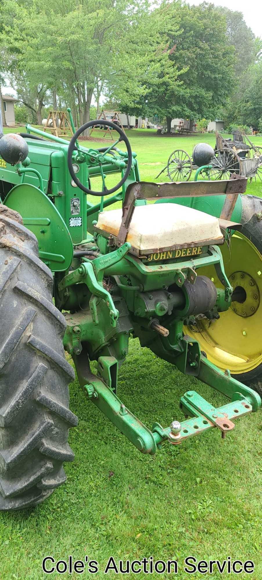 1950 John Deere Mt row crop tractor. In great condition, runs and drives excellent. Serial number