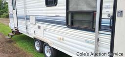 1994 Dutchman 36 ft dual axle camper trailer. Features dual axles, air conditioning camo expandal