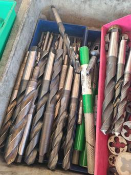 Huge group of industrial drill bits.