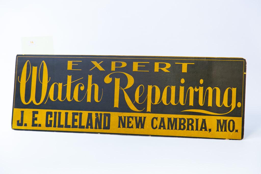 Expert Watch Repairing cardboard sign