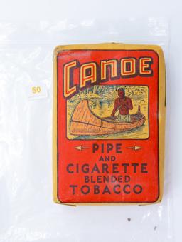 Canoe sealed tobacco package & contents