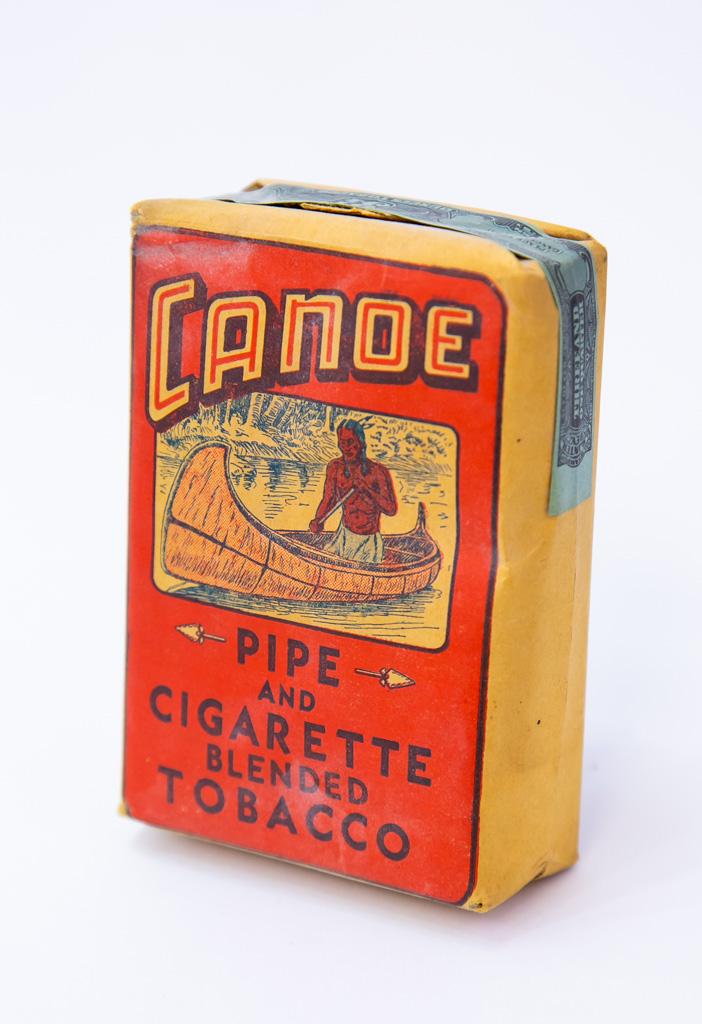 Canoe sealed tobacco package & contents