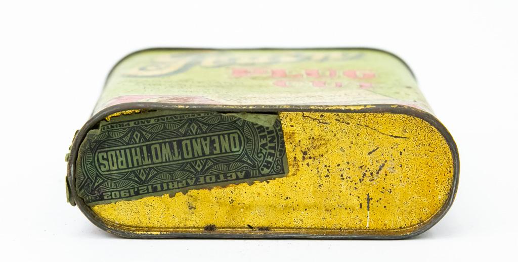 Grain plug cut pocket tobacco tin