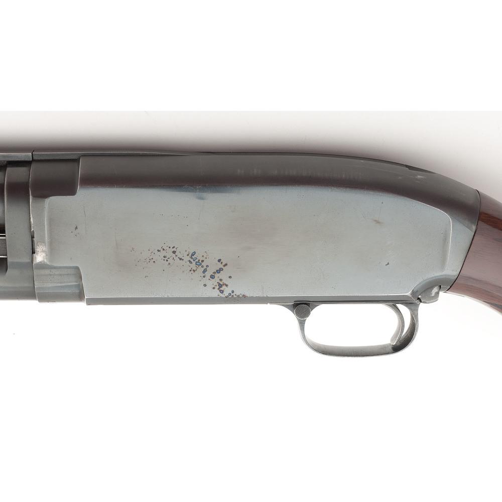 ** Winchester Model 12 Shotgun