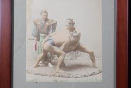 Framed  hand tinted photo of Japanese sumo wrestlers