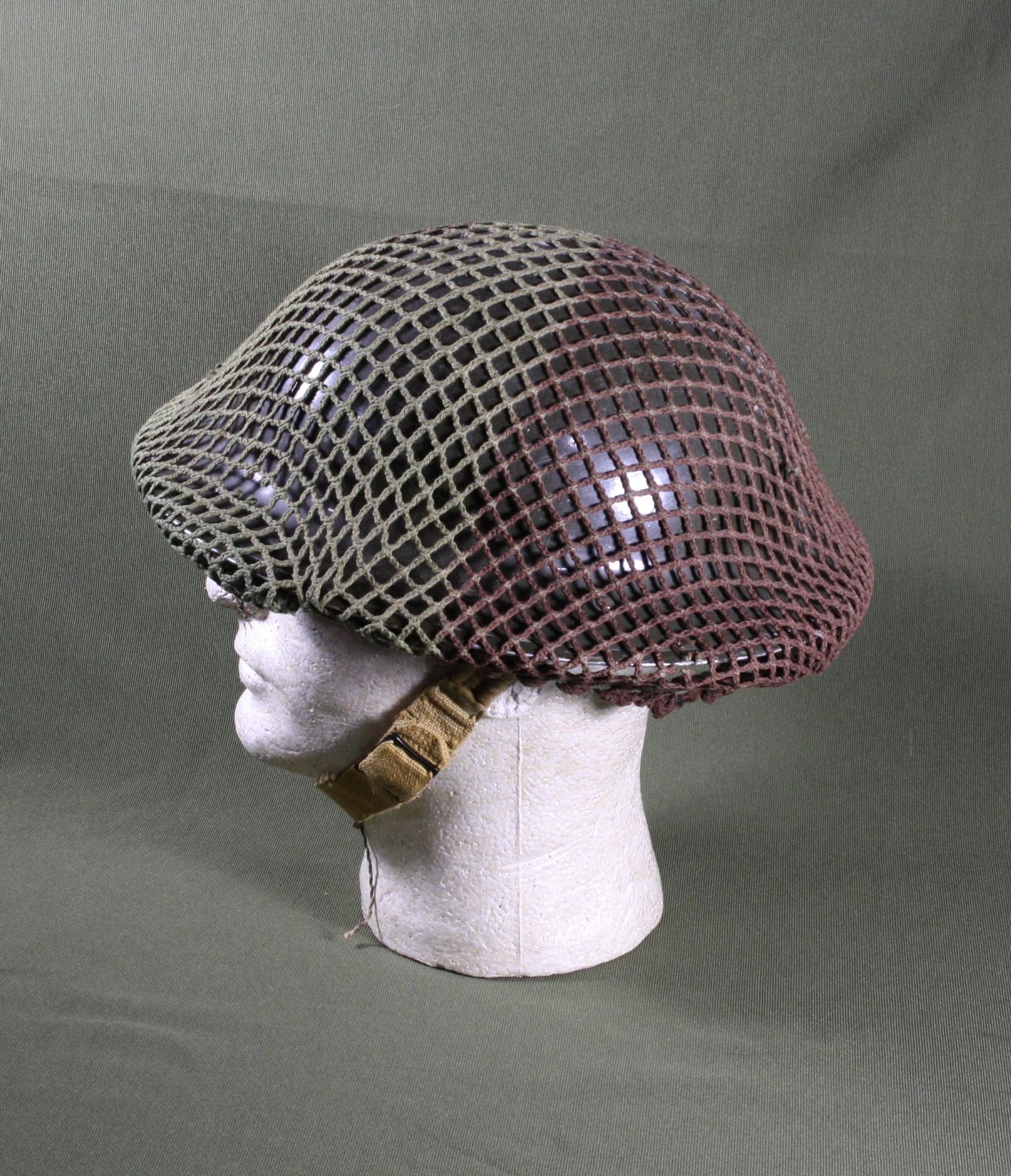 British WWII helmet w/camp net, liner and chin strap