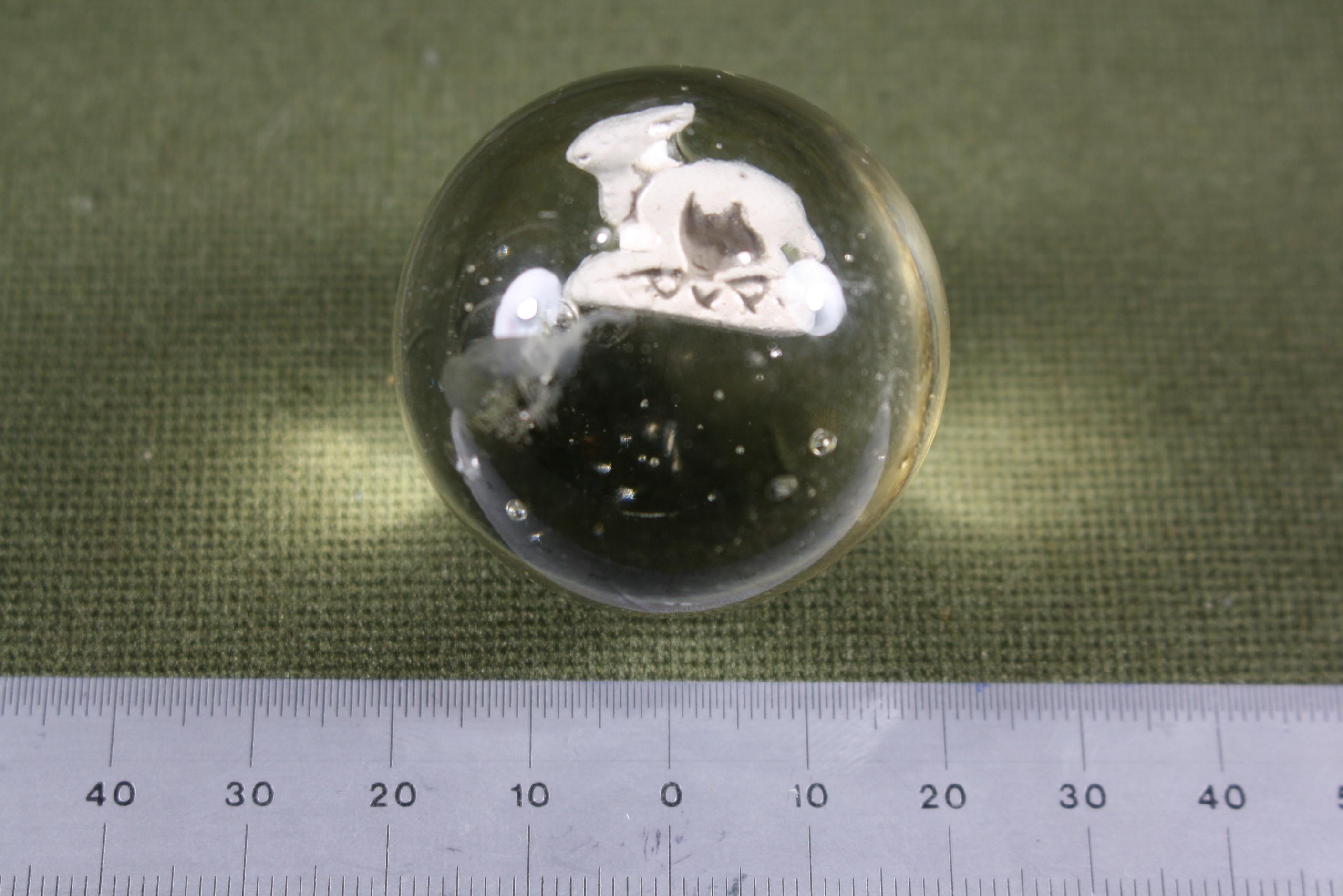 Antique sulfide marble with rabbit.