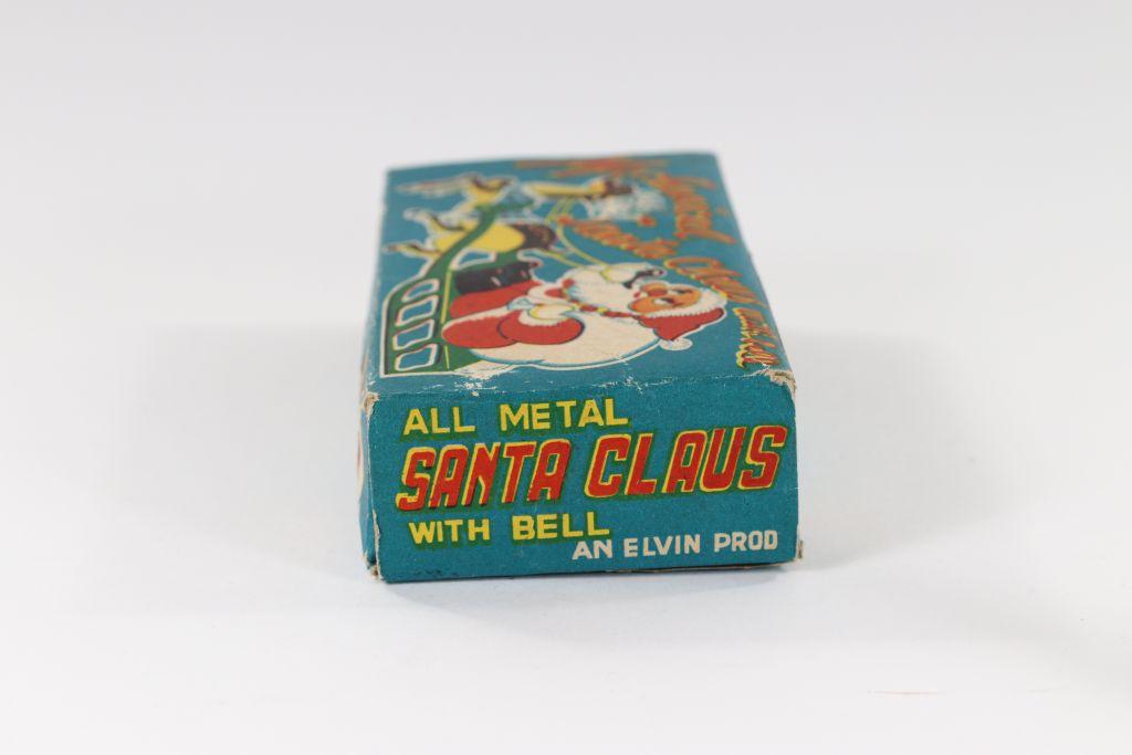 1950’s wind-up “Mechanical Santa Claus with bell”