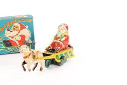 1950’s wind-up “Mechanical Santa Claus with bell”