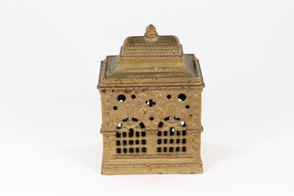 Antique cast iron “Bank” building coin bank