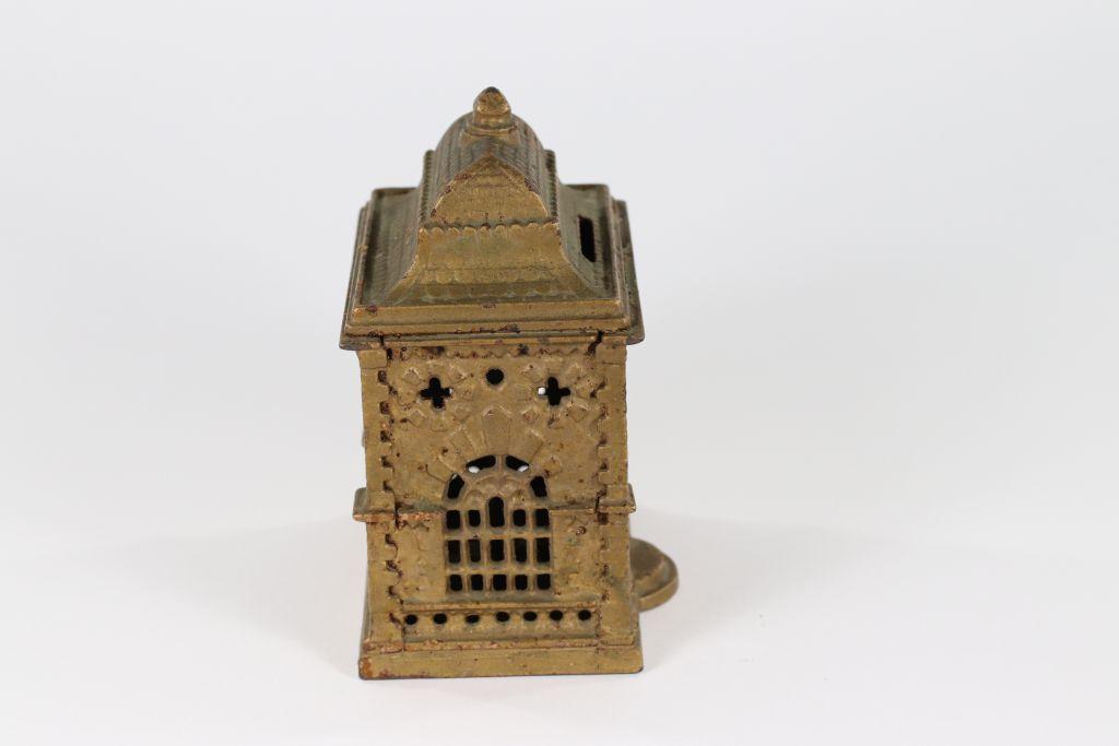 Antique cast iron “Bank” building coin bank