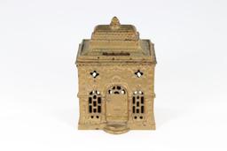 Antique cast iron “Bank” building coin bank