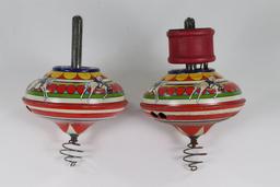 (2) antique tin litho spinning tops